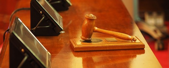 Gavel and screens at court