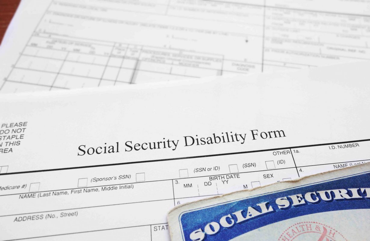 A social security disability form and a social security card