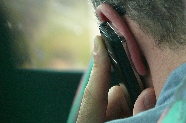 Closeup of a man having a phone call